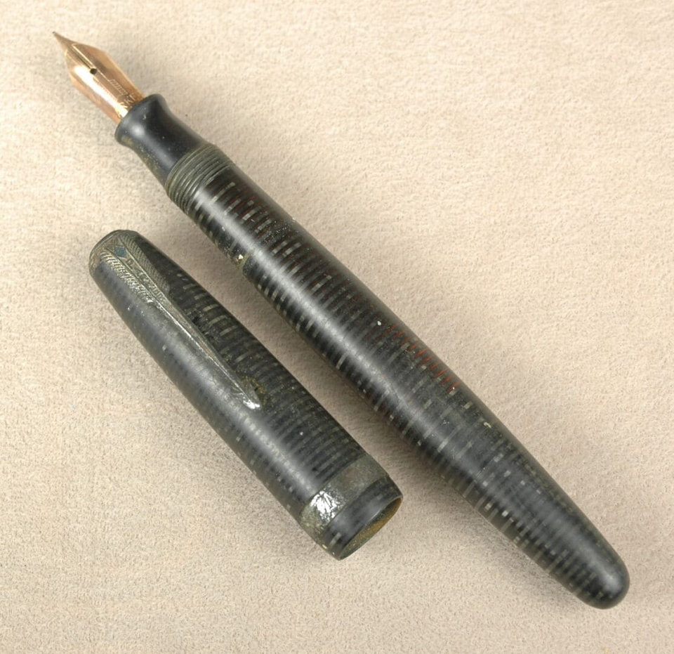 Vintage fountain pen with cap removed, before restoration