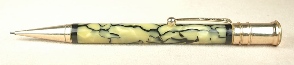 Vintage pen with marbled barrel design.