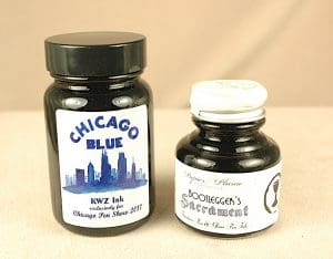 Two bottles of ink on display.