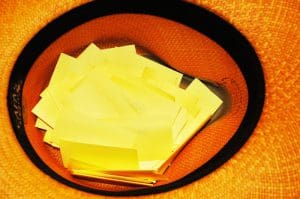 Yellow post-it notes under a warm light.