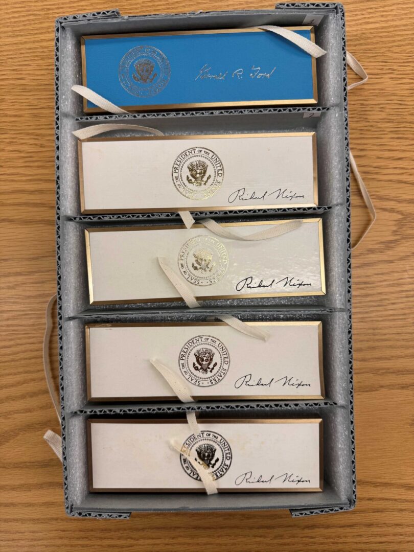 Presidential signing pens of Richard Nixon and Gerald Ford.